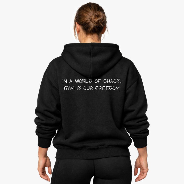 IN A WORLD OF CHAOS, GYM IS OUR FREEDOM Oversized (Backprint) Hoodie